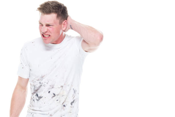 istock Young attractive male painter standing on white background - emotional stress 1144002704