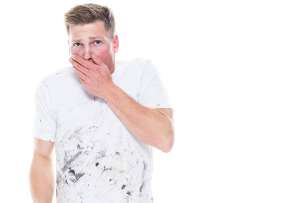 istock Young attractive male painter standing on white background - fear 1144002907