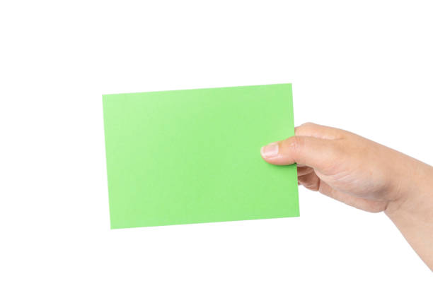 istock Hand grabbing a green card 1144022008