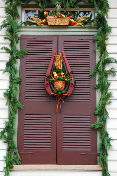istock A Christmas wreath on a shuttered window 1144032475
