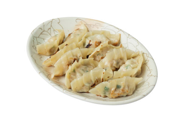 istock fried dumplings or gyoza isolated on white background 1144033334