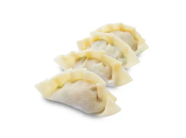 Photo of raw dumplings or gyoza isolated on white background