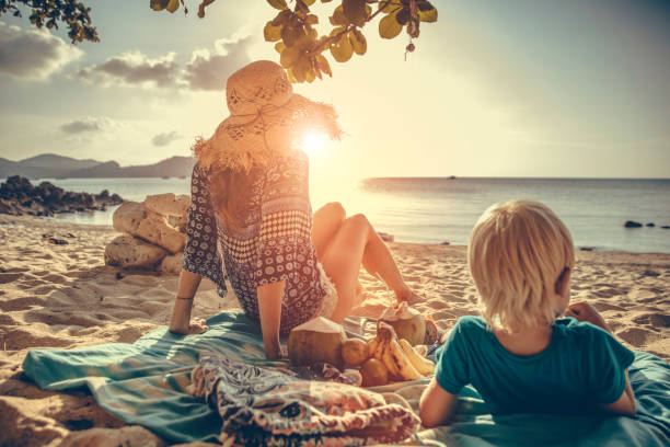 Family picnic on tropical beach