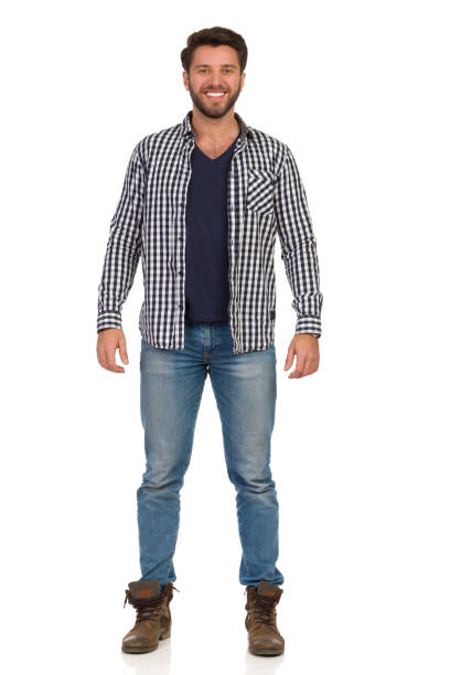 istock Smiling Handsme Man In Jeans And Unbuttoned Lumberjack Shirt Front View. 1144035099