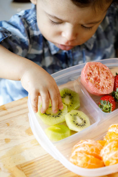 istock Baby eating fruits and vegetables 1144036333