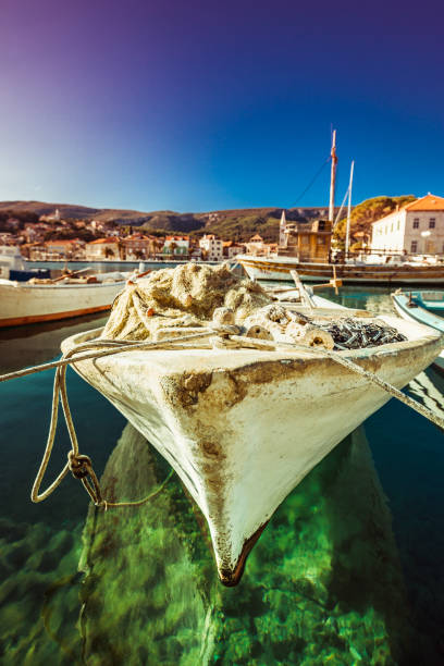 Fishing boats moored at small marina on Adriatic sea.