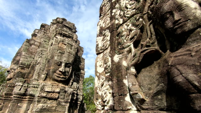 Ancient stone faces Bayon temple, Angkor Wat, Siam Reap, Cambodia