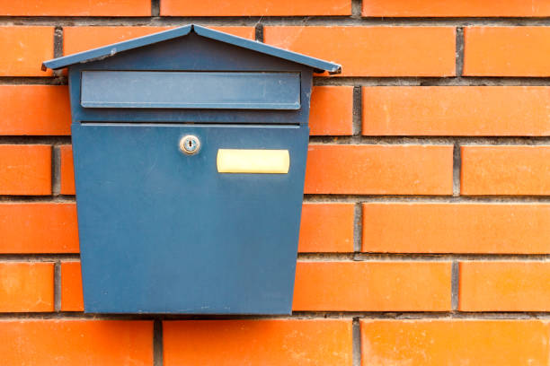 istock A beautiful mailbox hangs waiting for newspapers, parcels and letters. 1144051900