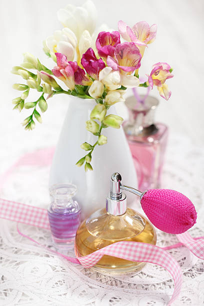 istock Vintage perfume bottles and flowers 114405278
