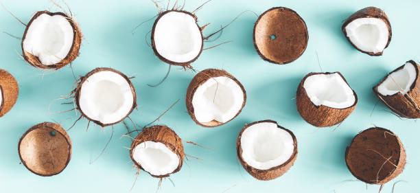 istock Summer composition. Coconut pattern on pastel blue background. Summer concept. Flat lay, top view 1144060428