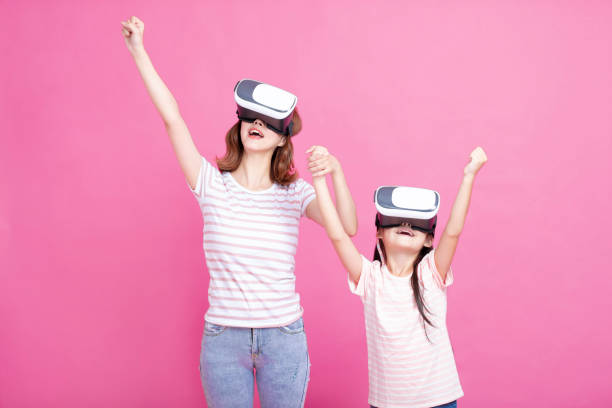 Mother and child playing together with virtual reality headsets