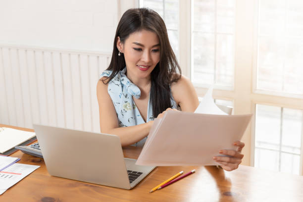 istock Freelancer business woman working with computer laptop in cafe. 1144069306