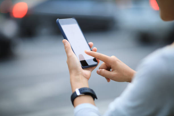 istock Woman use smartphone at city 1144074822