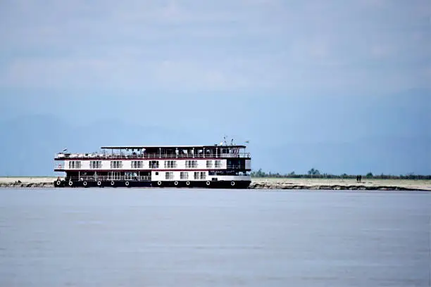Flat bottom boat for tourism holiday on River Assam in India, Asia