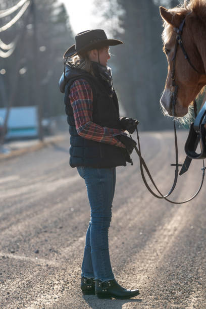 istock Cowgirl horseback riding 1144079578