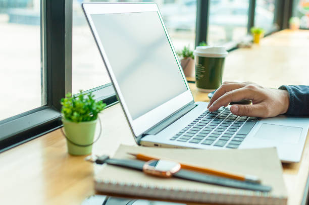 istock employees are typing notebooks and using cell phones for business keyboards. 1144079775