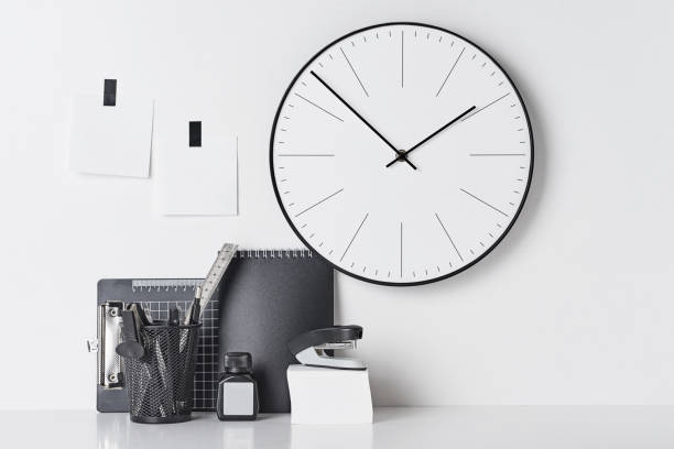 istock Office supplies, sticky and round clock on white 1144083382