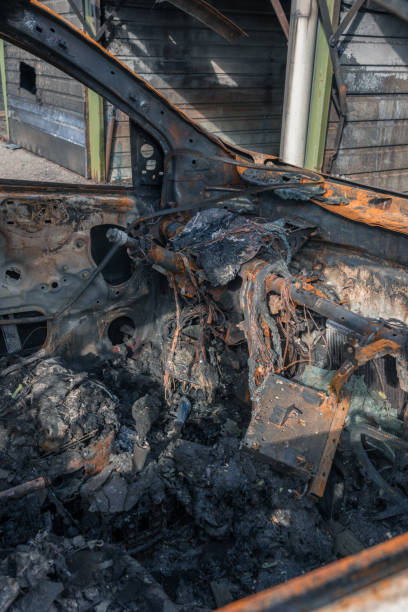 istock Interior of a completely burned car in the suburbs 1144087654