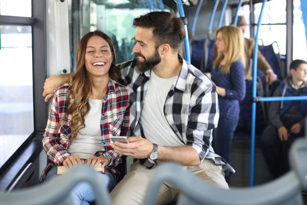 istock Young couple having fun in the bus 1144089167