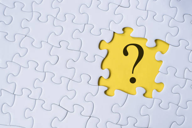 istock Full Frame Shot Of Jigsaw Pieces With Question Mark 1144091790