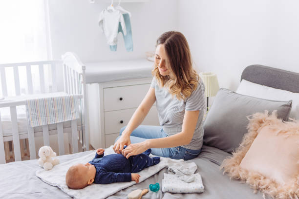 istock Changing baby clothing 1144108864
