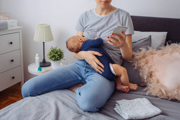 istock Mother breastfeeding baby 1144111293