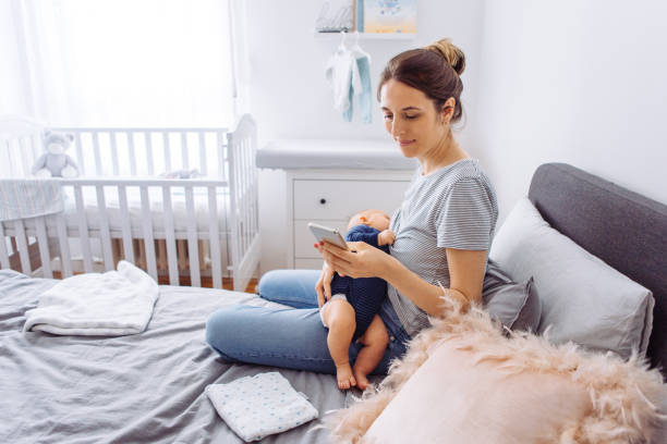 istock Mother breastfeeding baby 1144111400