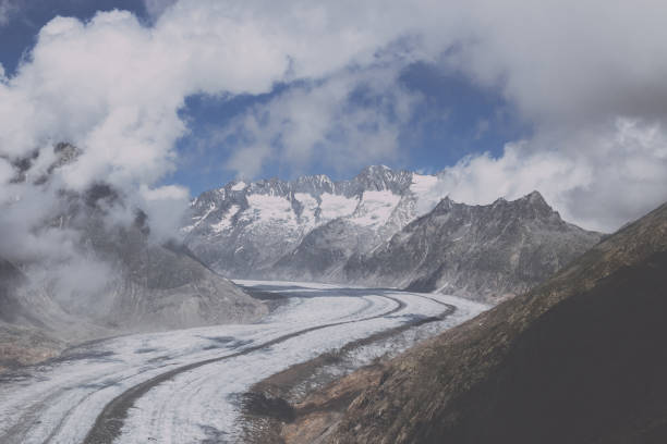 istock Panorama of mountains scene, walk through the great Aletsch Glacier 1144112922