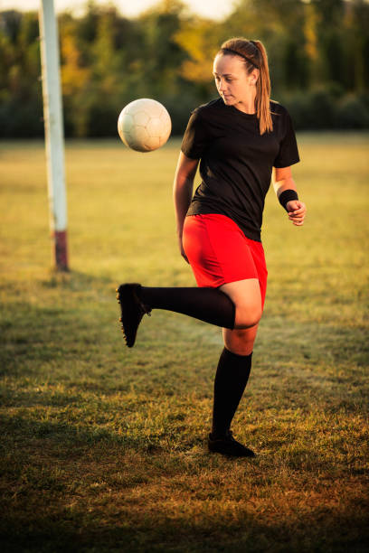 istock Female soccer player outdoors 1144115552