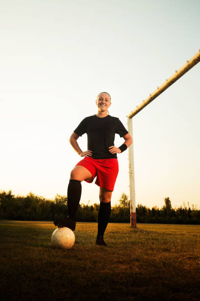 istock Female soccer player outdoors 1144116735