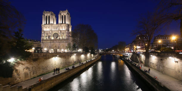 istock Notre-Dame and Seine at night 1144129236