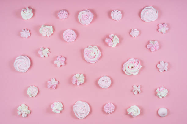 istock Pink Meringue Sweet Birthday Cake Pattern Flat Lay 1144131650