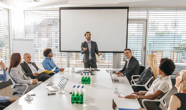 istock Young manager talking to his colleagues during a presentation in the office. 1144132723