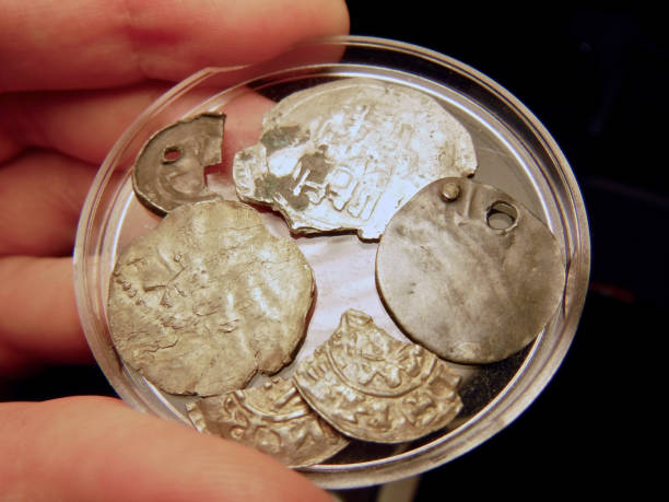 istock Ancient coins in the collector's hand 1144138294