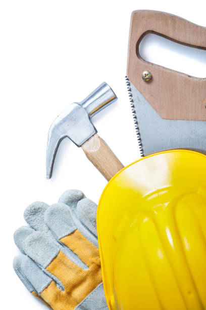 istock handsaw gloves hammer helmet isolated on white 1144139047