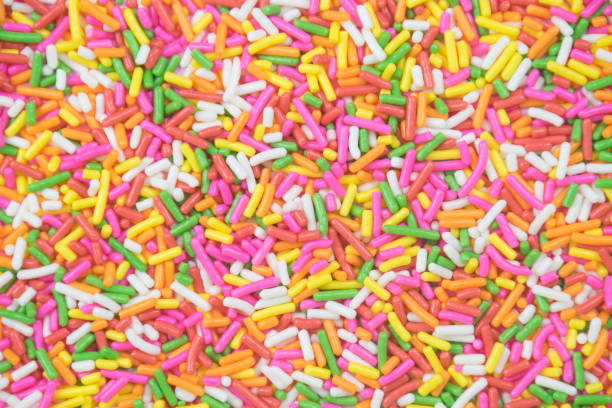 istock sprinkles background, sugar sprinkle dots, decoration for cake and bakery 1144139649
