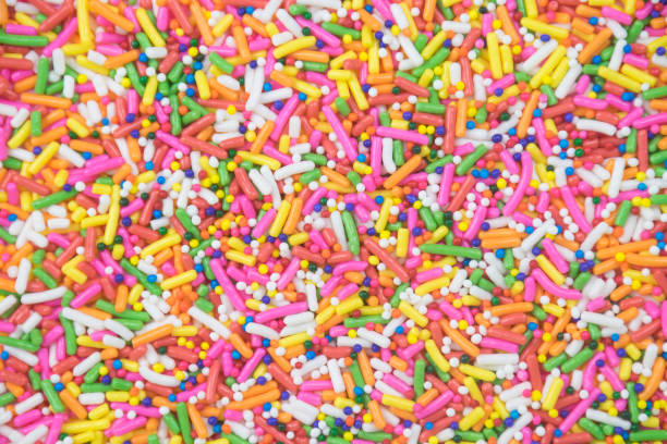 istock sprinkles background, sugar sprinkle dots, decoration for cake and bakery 1144139766
