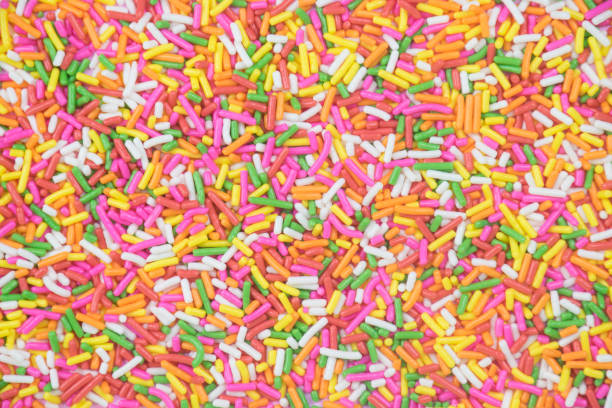 istock sprinkles background, sugar sprinkle dots, decoration for cake and bakery 1144139767