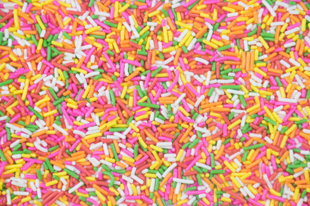 istock sprinkles background, sugar sprinkle dots, decoration for cake and bakery 1144139770