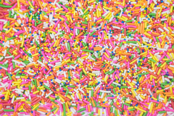 istock sprinkles background, sugar sprinkle dots, decoration for cake and bakery 1144140540