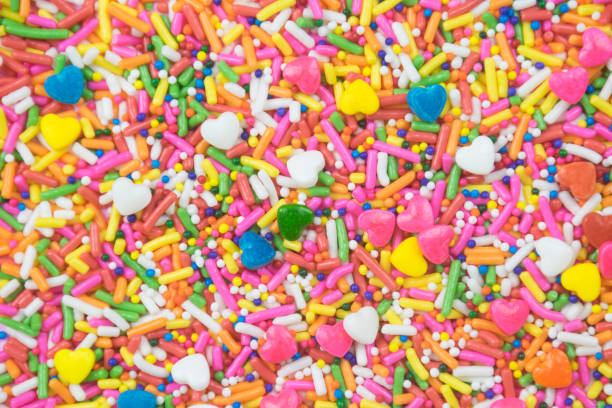 istock sprinkles background, sugar sprinkle dots, decoration for cake and bakery 1144140611