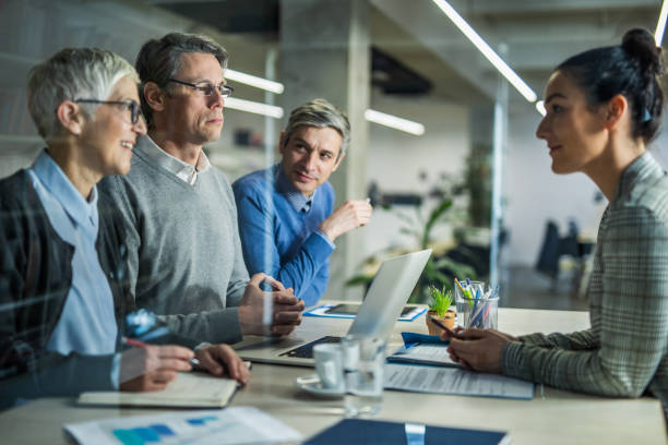 istock Members of human resource team having a talk with their candidate on a job interview. 1144140736