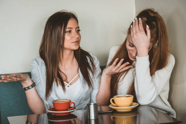 istock Young Female Friends is Having a Coffee Break 1144143908