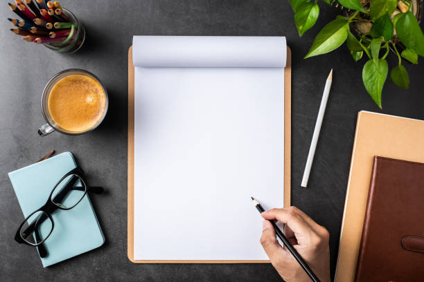 istock white paper with clipboard on black background 1144144117