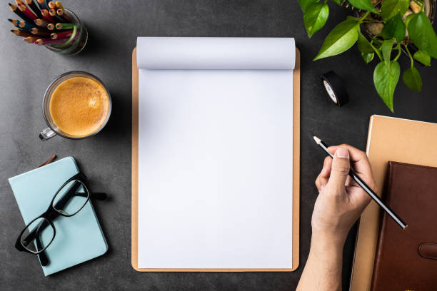 istock white paper with clipboard on black background 1144144128
