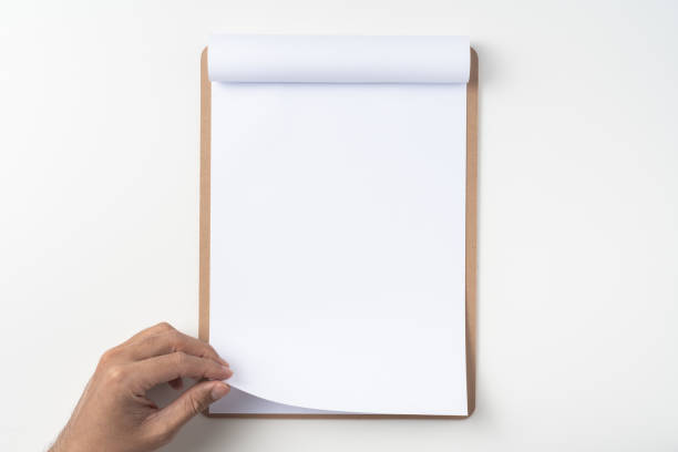 istock white flipped paper on clipboard isolated on white 1144144308
