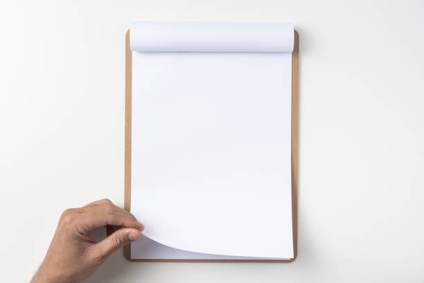 istock white flipped paper on clipboard isolated on white 1144144309