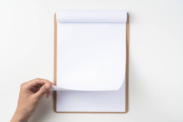 istock white flipped paper on clipboard isolated on white 1144144319