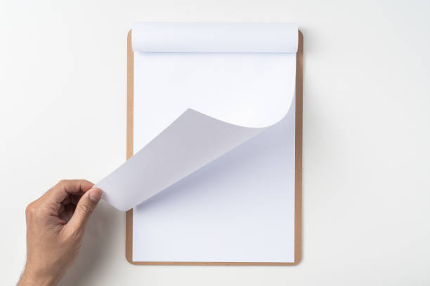 istock white flipped paper on clipboard isolated on white 1144144330