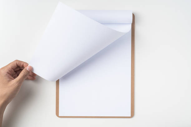 istock white flipped paper on clipboard isolated on white 1144144346